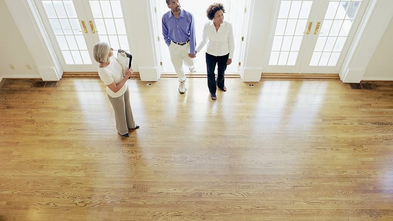 two people with realtor in house EOhMdBw.width