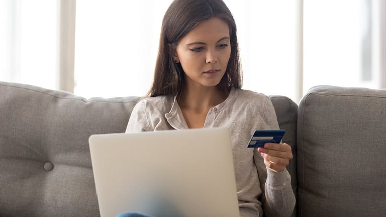 Woman with credit card laptop XrheSHb.width .jpg