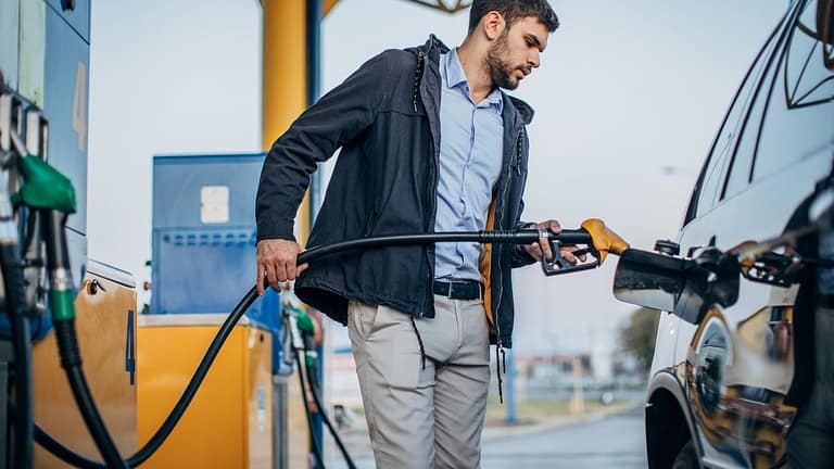 person pumping gas into car WkyEFR.width .jpg