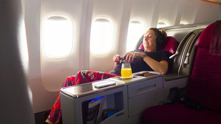 Airplane passenger flying business class cwqh.width .jpg
