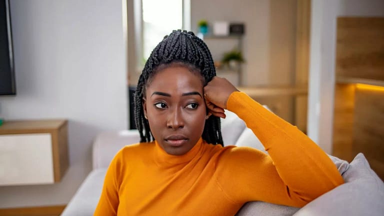 person looking stressed on couch JHTgI.width .jpg