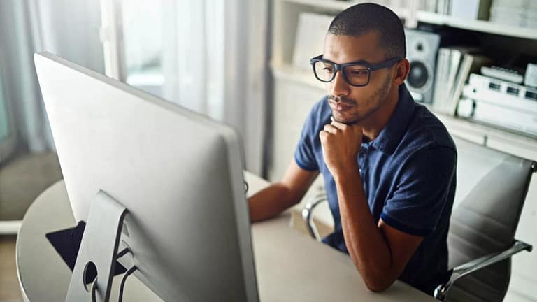 serious young man at computer.width .jpg