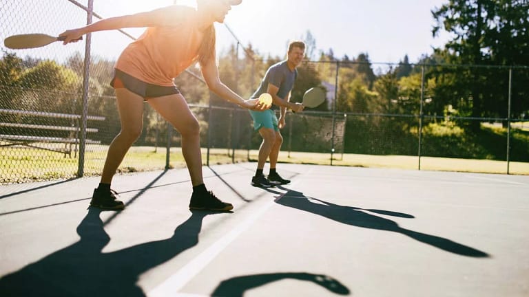 Pickleball players on a court. RTxCCV.width .jpg