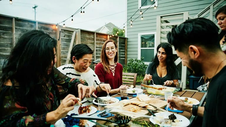 friends at backyard dinner party HUYIuZ.width .jpg