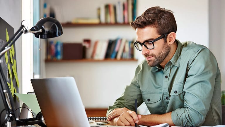 man s glasses laptop gettyimages .jpg
