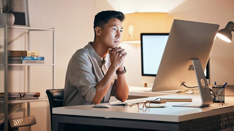 man s serious comp monitor gettyimages .jpg