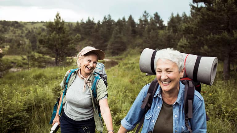 two older people outside hiking.jpg