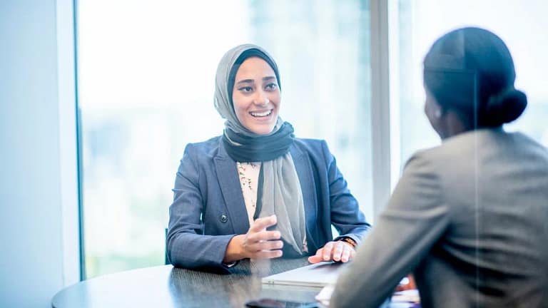two people in office meeting EfIbzFz.width .jpg