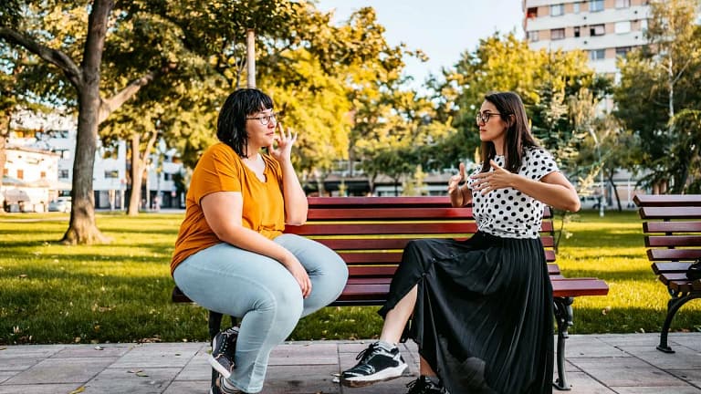 two people on park bench pELhneV.width .jpg