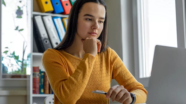 young woman looking at laptop.jpg