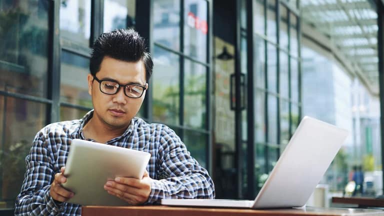 Man reading tablet jNq.width .jpg