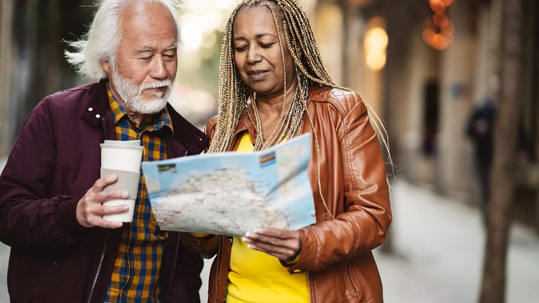 couple with map and a coffee cup.jpg