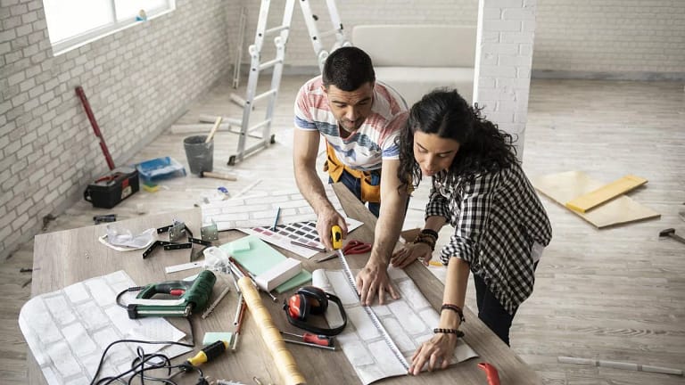 couple making home improvements.width .jpg
