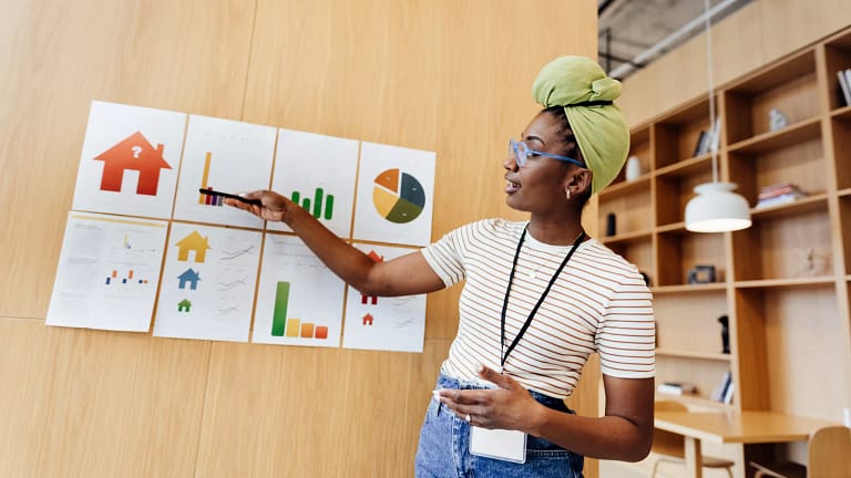 financial literacy teacher at a board.jpg