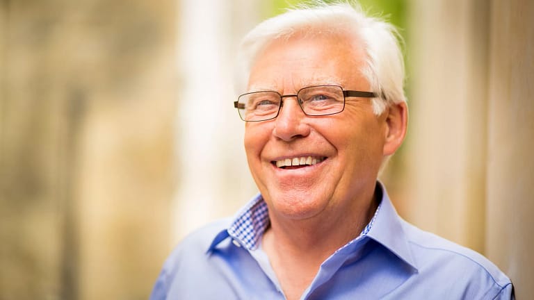 getty person smiling looking outward.jpg