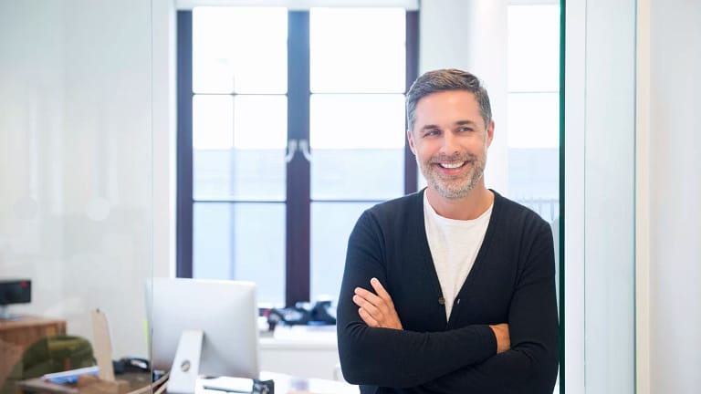 man s in front of desk gettyimages .jpg
