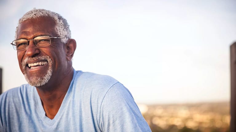 man s smiling outdoors gettyimages .jpg