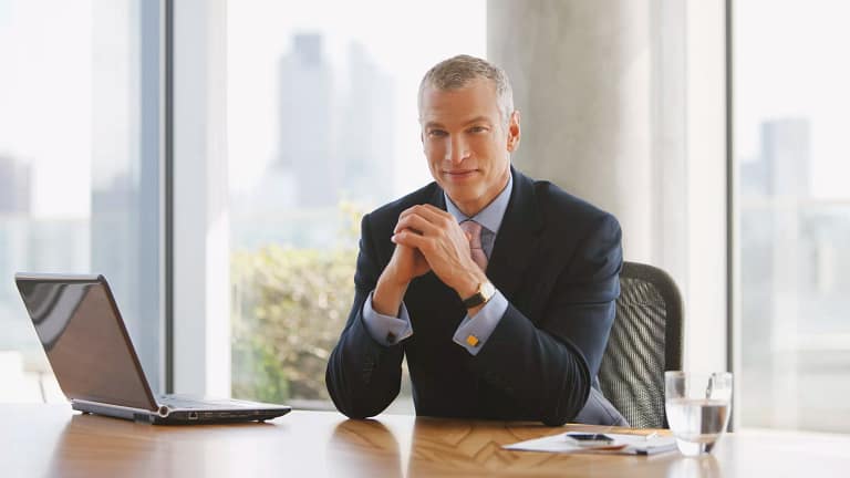 man biz suit desk gettyimages .jpg
