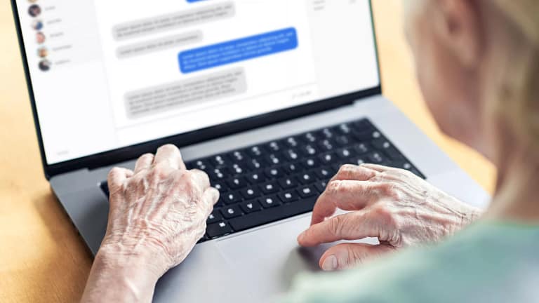 older lady and a chat going on computer screen.jpg