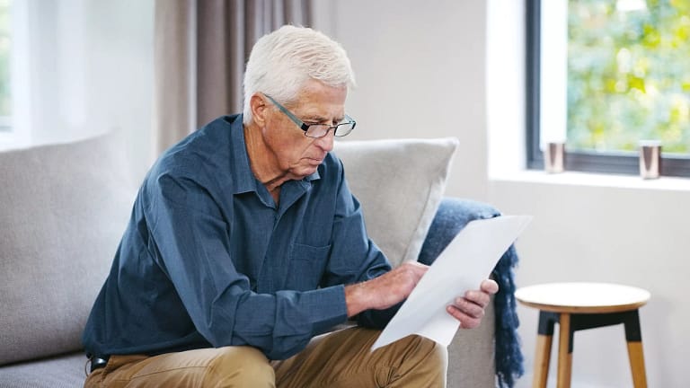 older man couch document gettyimages .jpg
