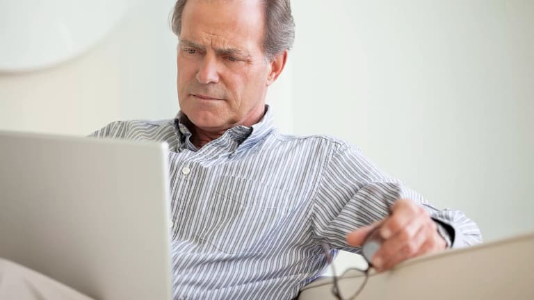 serious senior using laptop social security getty.jpg