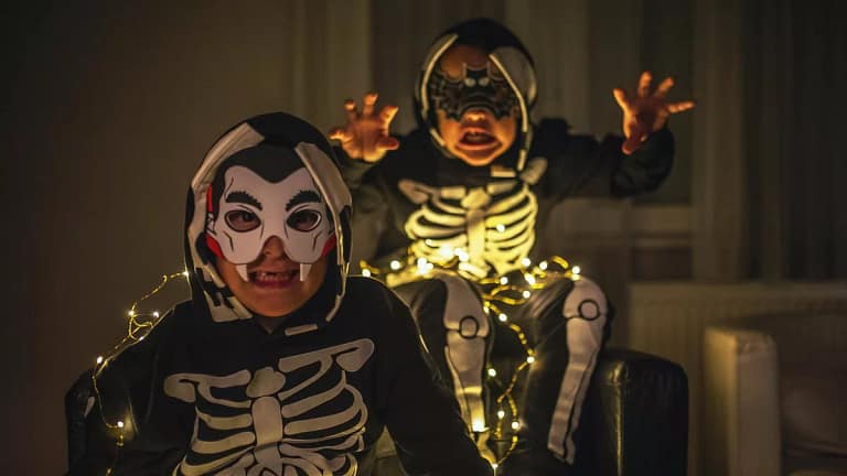 two young boys in Halloween costumes making s.width whBeGo.jpg