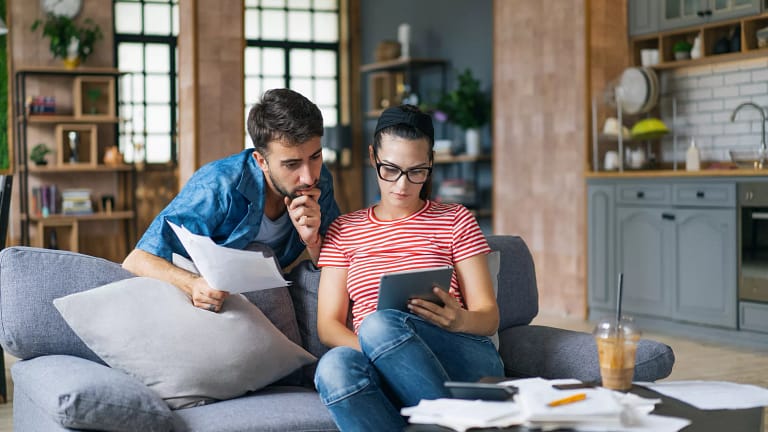young couple looking at ipad.jpg