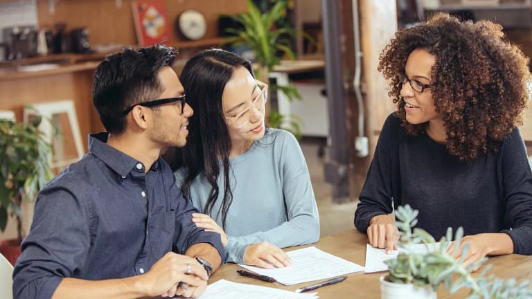 couple negotiating with lender.width .jpg