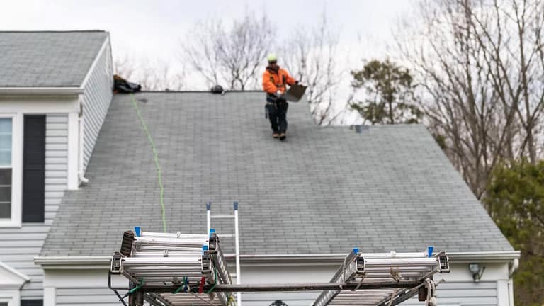 roofer on top of house oTuYRk.width .jpg