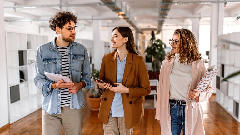 three gen z workers in an office.jpg