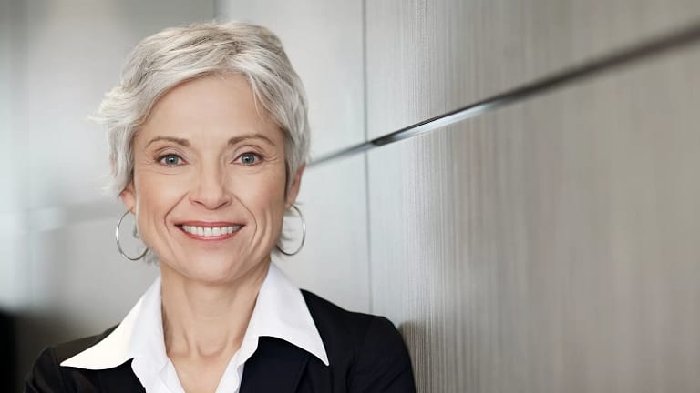 woman older gray hair suit gettyimages .jpg