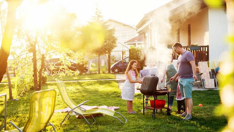 Family bbq in sunny backyard XxrMWN.width .jpg