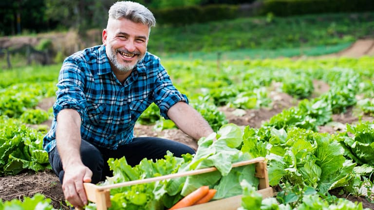 getty gardening smiling happy outdoors.jpg