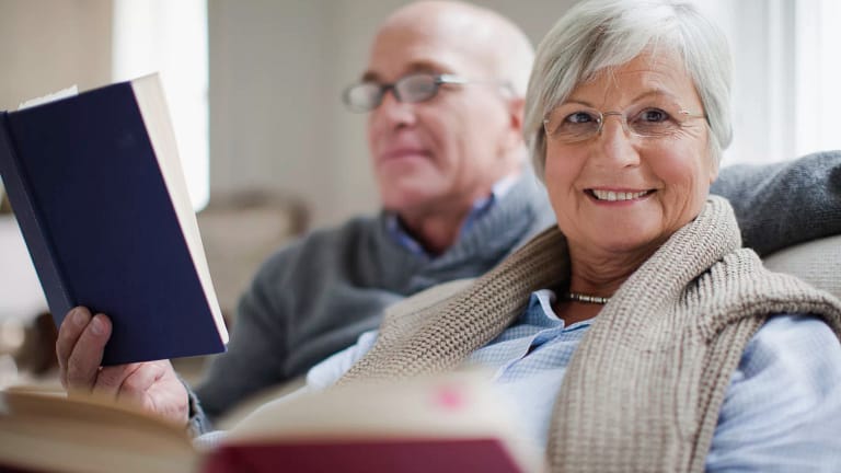 getty older couple reading books.jpg