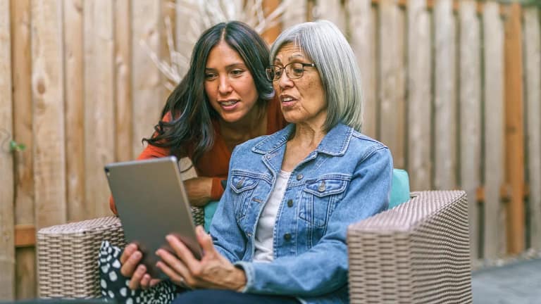two people looking at tablet together.jpg