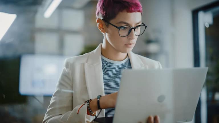young person staring at laptop.jpg