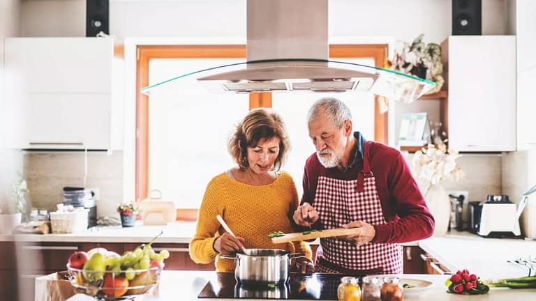 Older couple cooking at home gDjrP.width .jpg