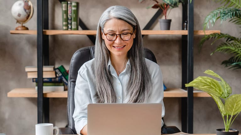 older woman laptop smiling gettyimages .jpg
