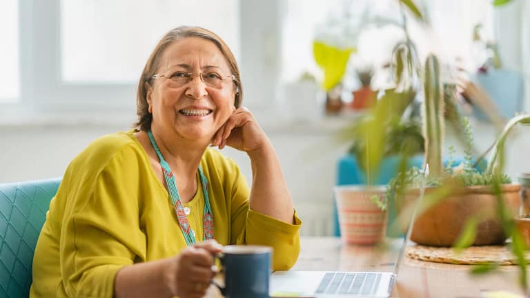 person sitting at a desk and smiling.jpg