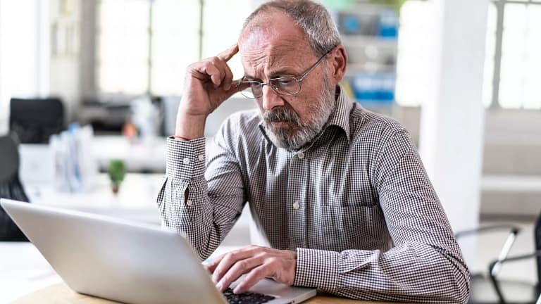 senior man laptop gettyimages .jpg