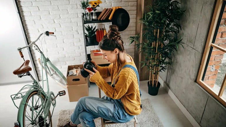 woman with camera and bike inside.width .jpg