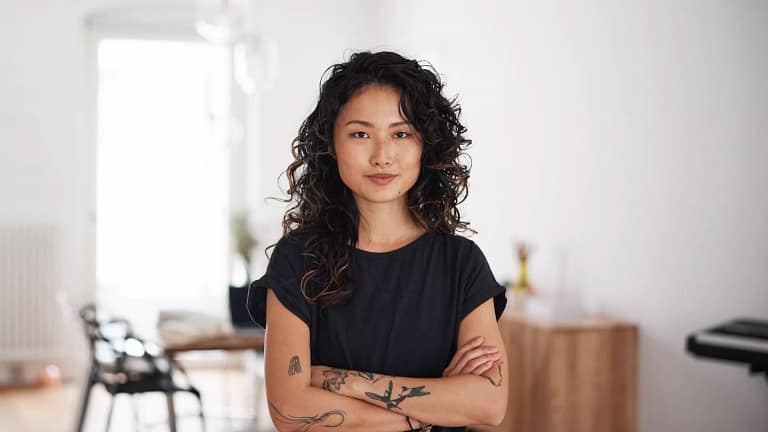 getty arms crossed strong serious expression thinking wondering.jpg
