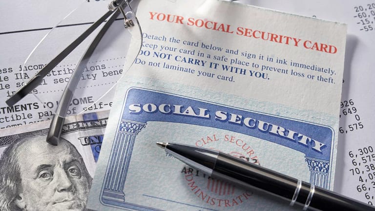 gettyimages social security glasses hundred dollar bill.jpeg