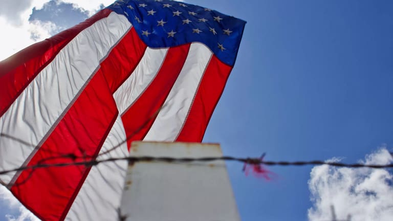 immigration barbed wire fence american flag us worker getty.jpg