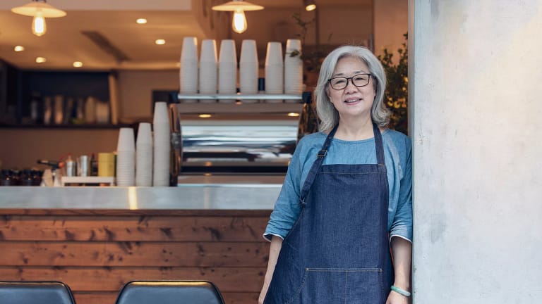 senior woman apron gettyimages .jpg