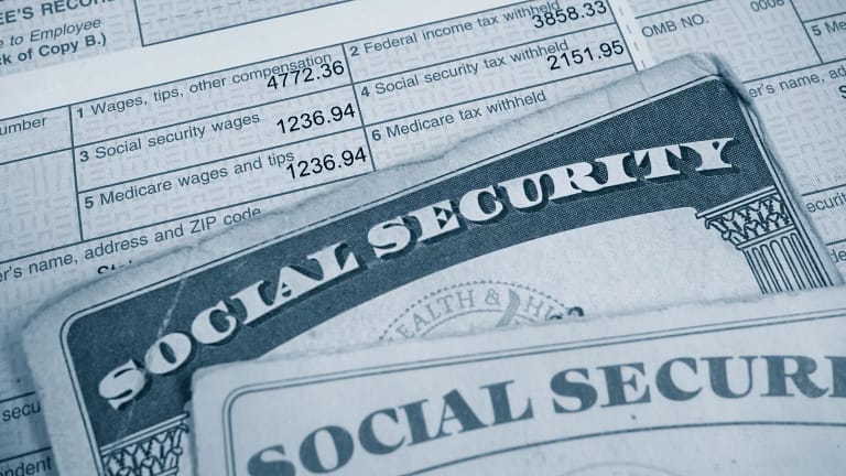 w tax form and social security cards payroll tax .jpg