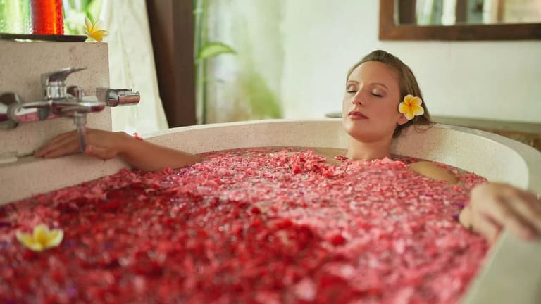 Woman relaxing in a soaking tub jbzLmS.width .jpg