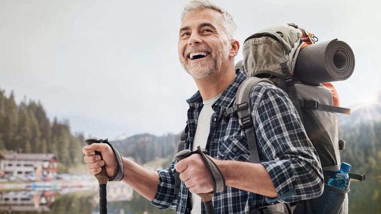 getty hiker outdoors flannel smiling happy.jpg
