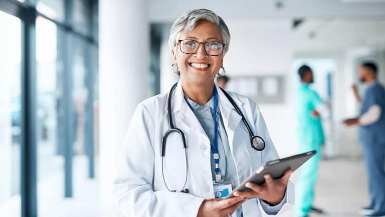getty smiling doctor healthcare happy.jpg