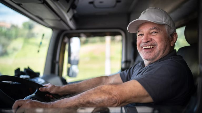getty smiling happy truck driver.jpg